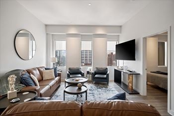 Furnished short-term rental living room at sky on main